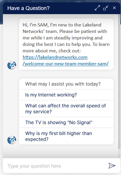 A screenshot showing the Lakeland Networks chat bot welcome screen. The text reads: "Hi, I'm SAM, I'm new to the Lakeland Networks team. Please be patient with me while I am steadily improving and doing the best I can to help you. To learn more about me, check out: https://test.lakelandnetworks.com/welcome-our-new-team-member-sam/. What may I assist you with today?"