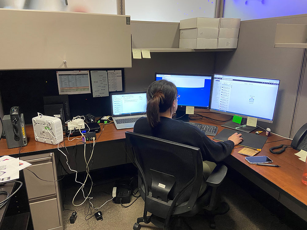 Amanda working at her desk